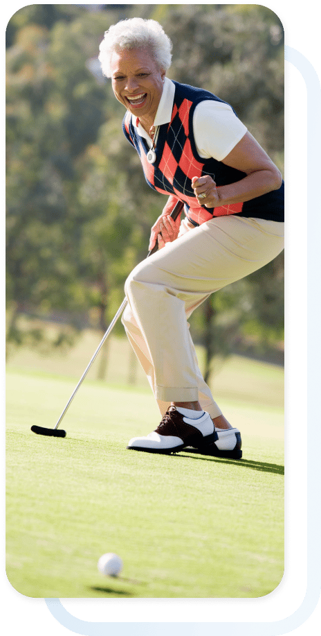 independent senior woman golfing