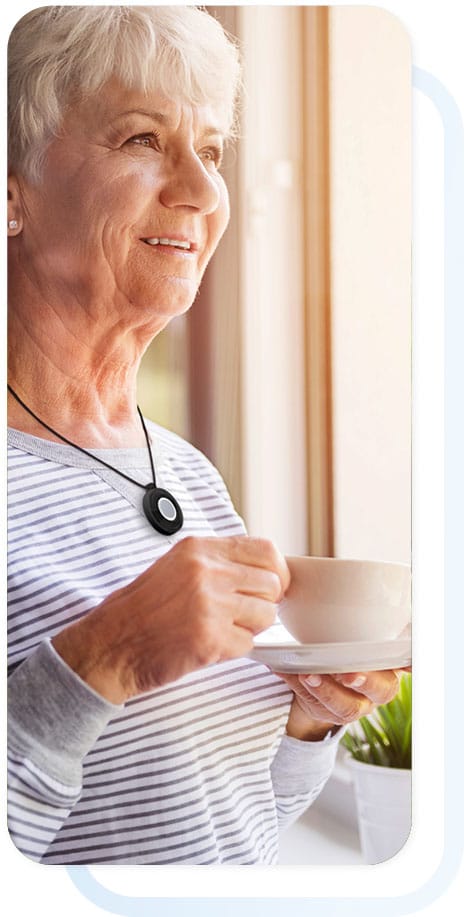 senior woman looking out window